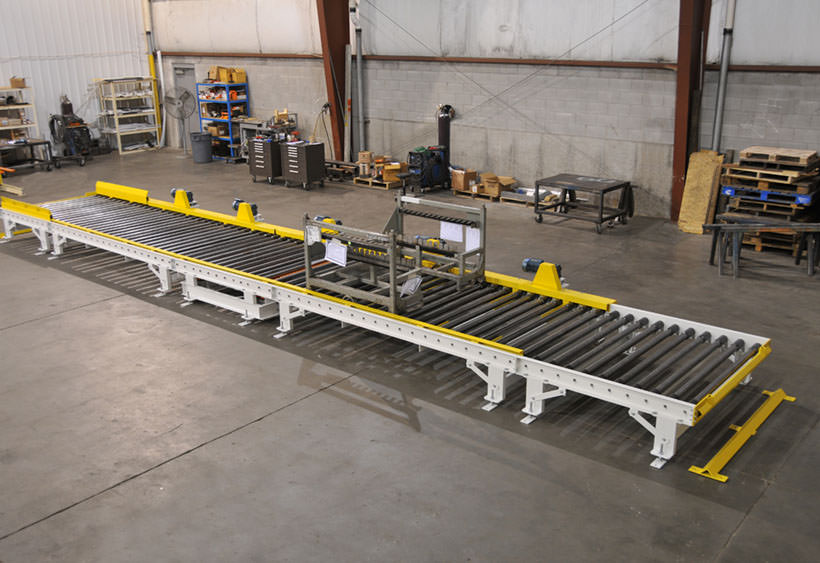 CDLR conveyor with blade stop and rack locator pins